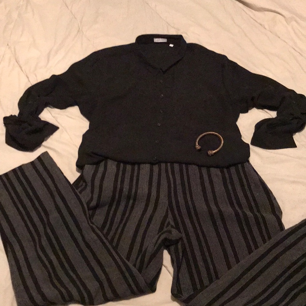 The top is an extra large The pants are a size 16